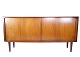 Small sideboard in teak wood of Danish design from around the 1960s. The sideboard has 2 sliding ...