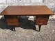 Desk in teak veneer, with solid teak legs. Danish modern from the 1960s. In good used condition. ...