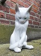 Figure of cat in porcelain from Royal Copenhagen in white glaze. Manufactured at the factory ...