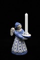 L. Hjorth ceramic angel in blue / white glaze which carries a small candle. Height:14cm. ...