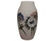 Small Bing & Grondahl large vase with multi coloured flowers.The factory mark tells, that ...