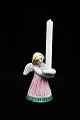 L. Hjorth ceramic angel in green / pink glaze carrying a small candle. no.421. Height:9,5cm. Is ...