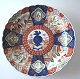 Imari plate, 
Japan, 19th 
century. 
Polycrom 
decoration. 
Dia.: 25 cm. 
With 
reparation. 
Rounded edge.