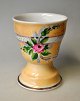 German 
chocolate 
porcelain mug, 
19th century. 
Yellowish 
luster 
overglaze. 
Hand-painted 
...