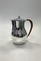 Hans Hansen 
Sterling Silver 
Coffee Pot 
designed by 
Karl Gustav 
Hansen. 
Measures 21cm 
high / ...