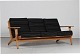Hans J. Wegner (1914-2007)Sofa model GE 290 made of solid oak.Original cushions with ...