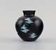 European studio 
ceramicist. 
Unique vase in 
glazed 
stoneware. 
Light blue 
touches on 
black ...