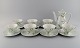 Bjørn Wiinblad for Rosenthal. "Summer" coffee service for seven people. 
Decorated with branches and green leaves. 1970s.
