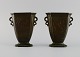 Just Andersen (1884-1943), Denmark. A pair of disko metal vases. Wavy handles. Woman holding ...