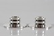 Georg Jensen 
Silver
Pair of low 
candle holders 
of sterling 
silver 925s
dessin no. 747 
A by ...