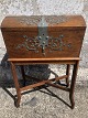 Small oak chest with metal fittings mounted on oak frame, appears without key in nice used ...