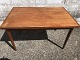 Teak veneer 
dining table 
with solid teak 
legs and 2 
pull-out tops. 
Danish modern 
from the 1960s. 
...