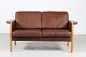 Danish Modern
Two seater 
sofa made of 
oak upholstered
with dark 
cognac 
colored/brown 
leather ...