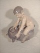 Faun on bear
Royal 
Copenhagen RC 
no 648
sold