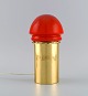 Hans Agne Jakobsson for A / B Markaryd. Brass table lamp with shade in red mouth blown art ...