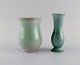 Karlsruhe, Germany. Two vases in glazed stoneware. Beautiful glaze in delicate shades of green. ...