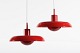 Piet Hein (1905-1996)A pair of small RA pendantsmade of metal with red lacquer ...