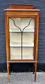 English display 
cabinet in 
mahogany, 1920s 
- 1930s. On 
tapered legs. 
With intarsia. 
With lock ...