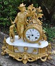 French gilded fireplace clock in zinc, approx. 1860. Lower part of white alabaster, renaissance ...