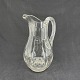 Height 21 cm.Finely decorated glass jug from the 1930s.It is ground a so-called snail ...