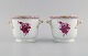 Herend Chinese Bouquet Raspberry. Two vases in hand-painted porcelain modeled 
with handles. Mid-20th century.
