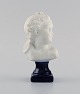 Limoges France. 
Biscuit child 
bust. Stand 
with dark blue 
glaze. Classic 
style. Early 
20th ...