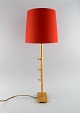 Nicolas de Wael for Fondica. Large table lamp in bronze with original red shade. France, ...