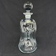 Height 29 cm.Kluk flask in clear glass with round stopper from Holmegaard.The flask is one ...