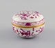 Meissen Pink Indian lidded trinket box in hand-painted porcelain. Pink flowers 
and gold decoration. Early 20th century.
