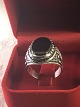 A silver 
gentleman rings 
in 925 s with 
agate oval 
black stone srt 
65