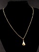 8 carat gold 
pendant 2 x 1.1 
cm. and chain 
46 cm. item no. 
505636