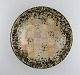 European studio 
ceramicist. 
Large unique 
bowl in glazed 
stoneware with 
checkered 
pattern. Dated 
...