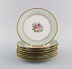 Tirschenreuth, Germany. Eight cake plates in hand-painted porcelain with flowers 
and gold decoration. Mid-20th century.
