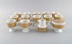 Tapio Wirkkala for Rosenthal. Coffee service for twelve people. Porcelain with 
gold decoration. 1970s.
