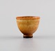 Berndt Friberg (1899-1981) for Gustavsberg Studiohand. Miniature vase / bowl in 
glazed ceramics. Beautiful glaze in light caramel shades. 1960s / 70s.
