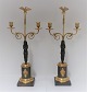 Empire bronze 
Candlesticks. 
Probably French 
about 1810. A 
pair. Height 48 
cm.