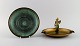 Zicu, Sweden. 
Large art deco 
ashtray and 
bowl in 
patinated 
metal. Mid 20th 
century.
The ashtray 
...