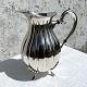 Jug silver-plated, 19 cm high, 18 cm wide. Nice condition.