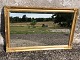 Faceted mirror 
in gold-painted 
frame. Some 
traces of use. 
84x54 cm