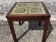 Small tiled 
table with 
green tiles. 
Danish modern 
from the 1970s. 
Dimensions: 
50x48.5x48.5 
cm. ...