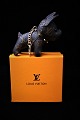 Original Louis 
Vuitton 
accessories, 
bag pendant / 
keyring in the 
shape of a 
small dog with 
...