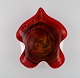Large leaf-shaped Murano bowl in mouth-blown art glass with wavy edges. Red shades. Italian ...