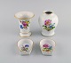 Meissen, 
Germany. Two 
vases and two 
small bowls in 
hand-painted 
porcelain with 
flowers and 
gold ...