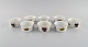 Royal Worcester, England. Eight small Evesham porcelain bowls decorated with 
fruits and gold rim. 1980s.

