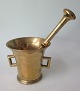 Danish brass mortar with pistil, 19th century. With two handles. Height: 10 cm. Pistil Length: ...