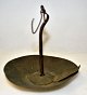 Oil lamp in 
brass, 18/19. 
year Samsø, 
Denmark. Bowl 
of tin brass. 
Holder of iron. 
H: 11 cm. Dia. 
...