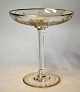 Antique champagne glass, 19th century Germany. Round foot, stilk and low bowl. With numerous ...