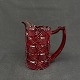Height 10 cm.Fine red pressed glass cream jug from Fyens Glasværk.The model appears in the ...