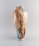 Arabia, 
Finland. Large 
art deco vase 
in glazed 
faience. 
Beautiful 
marbled glaze. 
...