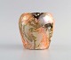 Arabia, 
Finland. Art 
deco vase in 
glazed faience. 
Beautiful 
marbled glaze. 
1920/30s.
Measures: ...